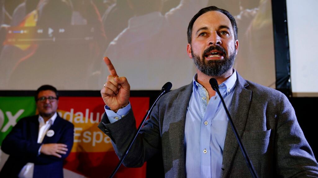 Spain’s far-right Vox party leader Santiago Abascal delivers a speech next to regional candidate Francisco Serrano as they celebrate results after the Andalusian regional elections, in Seville. Photograph: Marcelo Del Pozo/Reuters