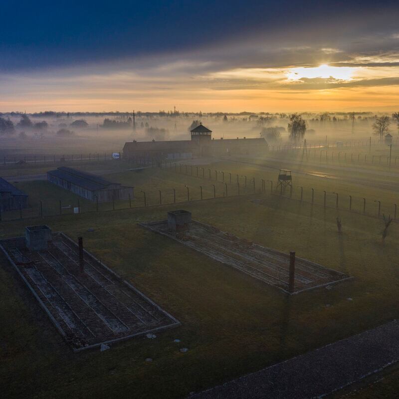 Auschwitz: the electrified barbed-wire fence and Death Gate at Auschwitz II-Birkenau, in Poland. Photograph: Christopher Furlong/Getty