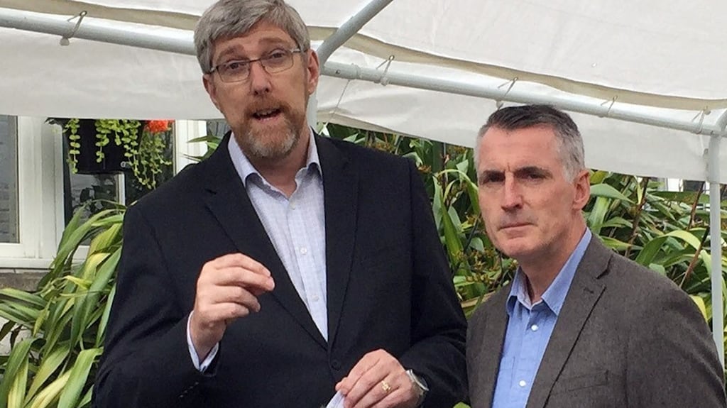 Sinn Féin’s John O’Dowd (l) and Declan Kearney speak to the media at Stormont Castle, Belfast. Photograph: David Young/PA Wire