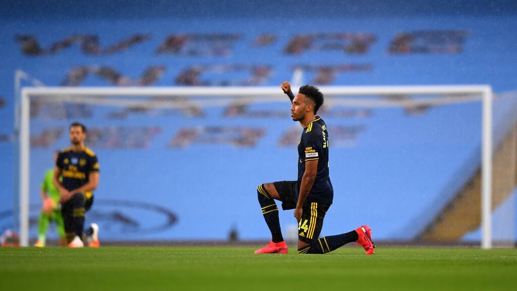 Arsenal’s Pierre-Emerick Aubameyang takes a knee in support of the Black Lives Matter movement. The Church of Ireland said taking the knee ‘has become a symbol of protest against racial injustice and an expression of solidarity’. Photograph: Laurence Griffiths/PA Wire/NMC Pool.