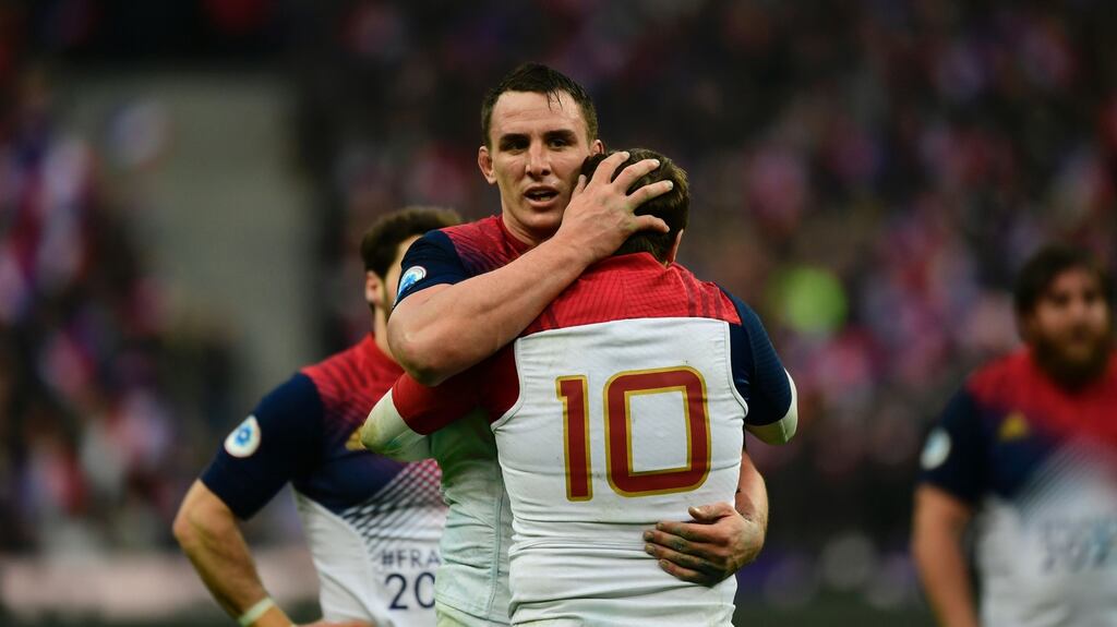 Louis Picamoles celebrates with Camille Lopez after France edged out Scotland in Paris. Photograph: AFP/ Simon Christophe