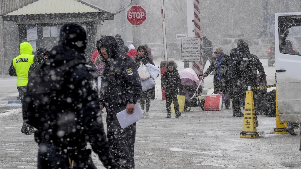 Ukrainian refugees fleeing the war cross the border between Ukraine and Moldova in Palanca, Moldova. At least 2.5 million people have fled Ukraine since the beginning of the Russian invasion. Photograph: EPA