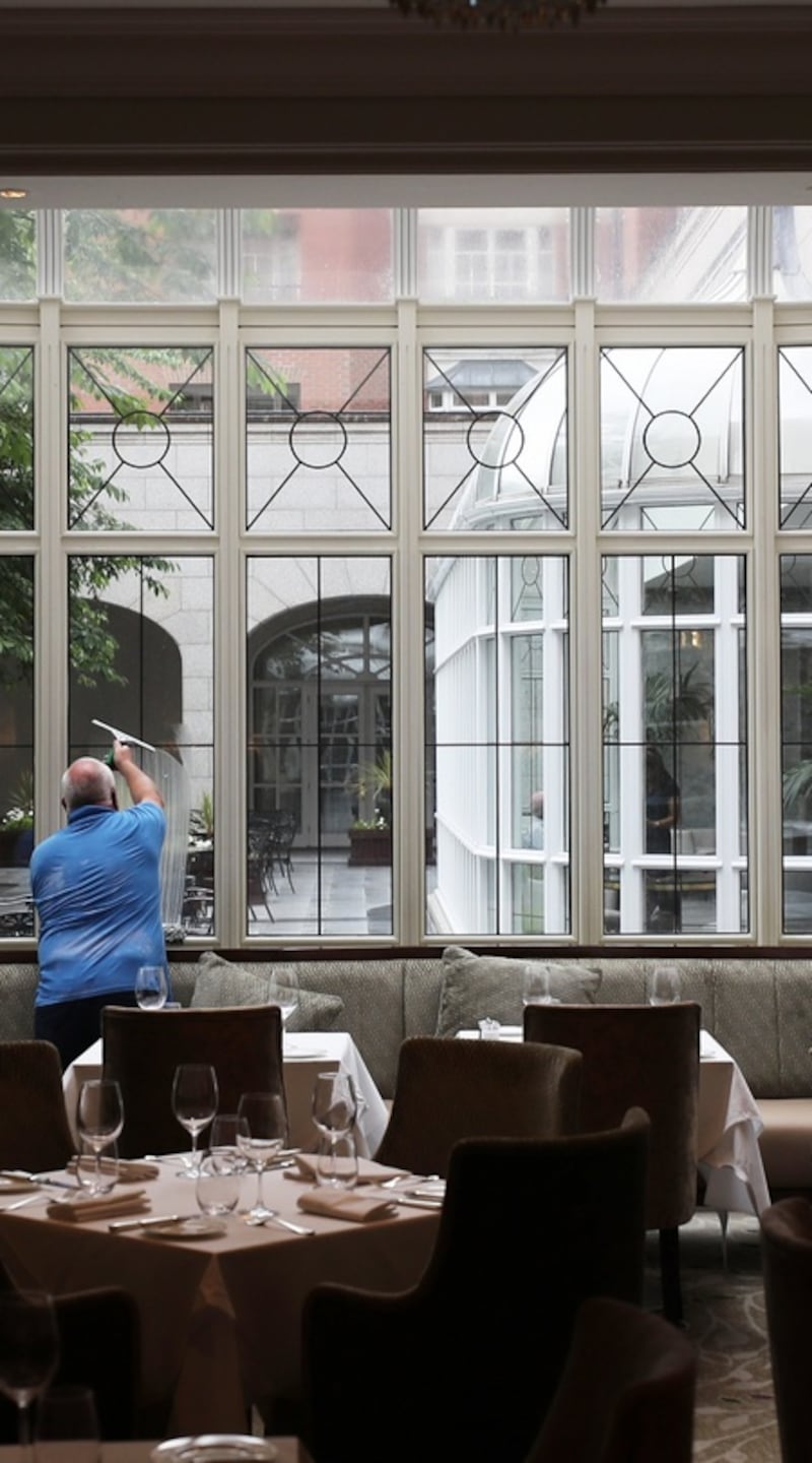 Window cleaning at the InterContinental prior to re-opening. Photograph: Nick Bradshaw/ The Irish Times