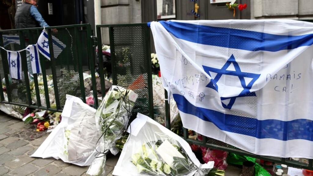 A woman stands at the entrance of the closed Jewish Museum in Brussels last week. Photograph: Reuters