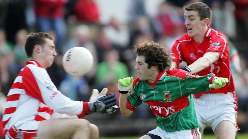 Cork’s Ray Carey tackles Mayo’s Mark Ronaldson during the 2006 All-Ireland under-21 final. Photograph: Lorraine O’Sullivan/Inpho