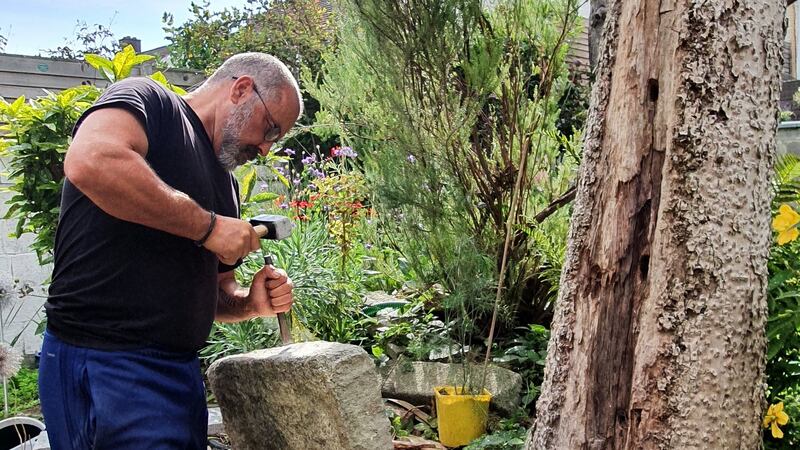 Long-time taxi driver Dave Murphy using his skills as a stone mason