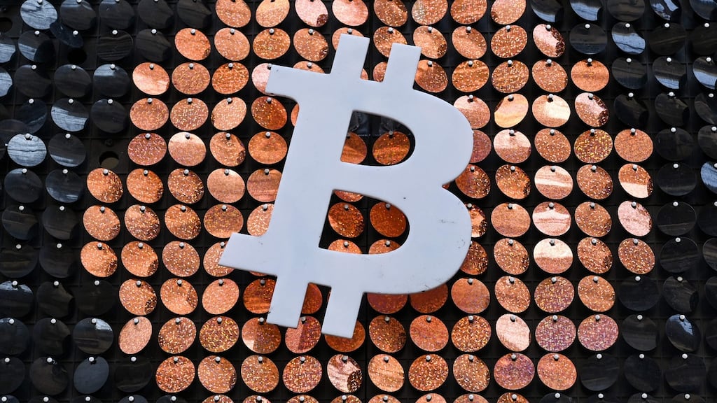 Logo of Bitcoin digital currency. Photograph: Nicolas Tucat/AFP via Getty