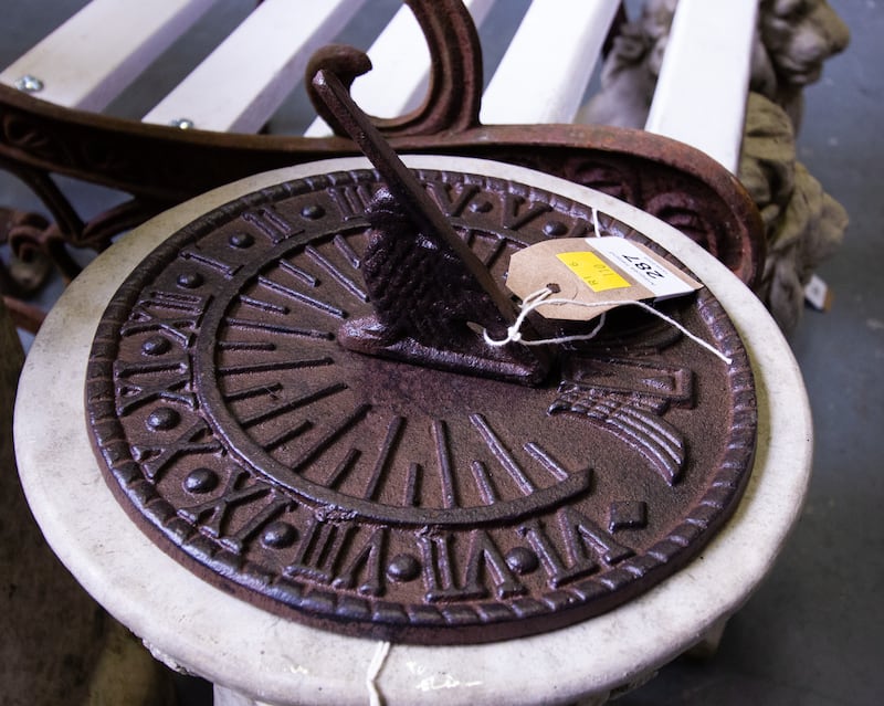 Iron sundial at Keighery's garden furniture auction (€30-€50)
