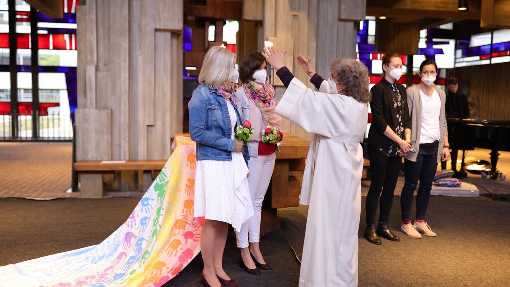 Brigitte Schmidt, a pastoral worker, blesses a same-sex couple, Nini and Juliana Weinmeister-Bisping, at the Catholic St Johannes XXIII church in Cologne, Germany. Photograph: Andreas Rentz/Getty