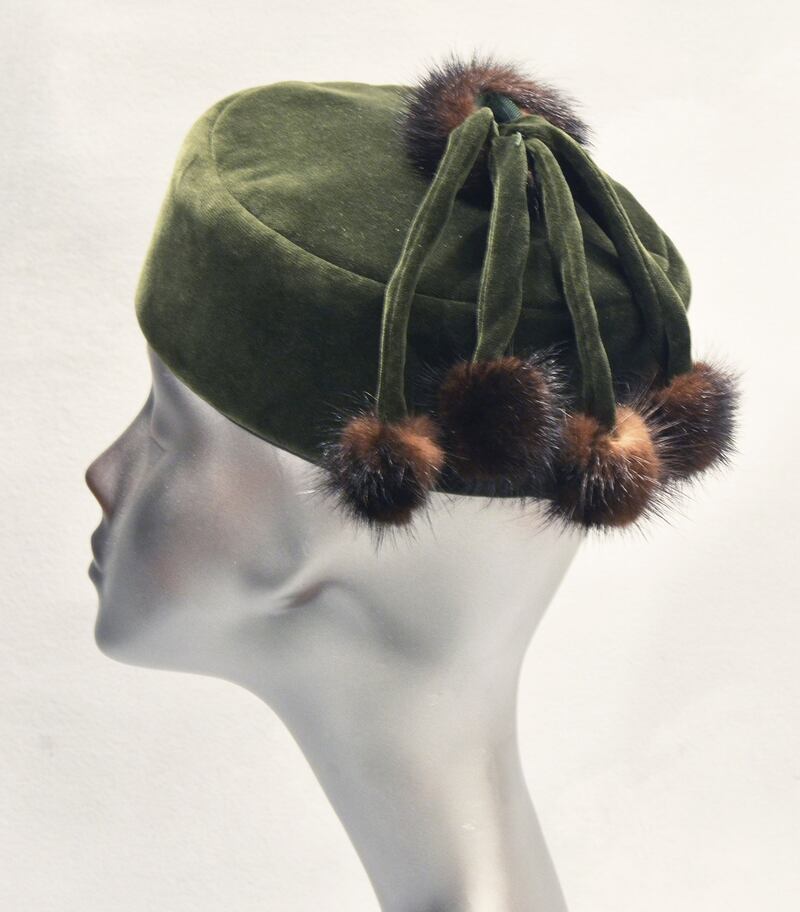 Green velvet pillbox hat with fur-tipped tassels from Eily Henry Vintage (€48)