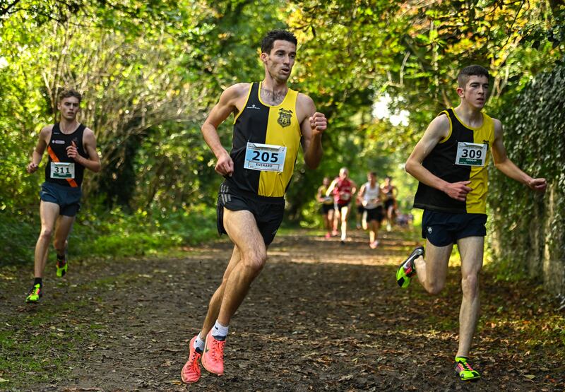 Eoin Everard (centre) of Kilkenny City Harriers AC won the master men's 8,000m. Photograph: Sam Barnes/Sportsfile