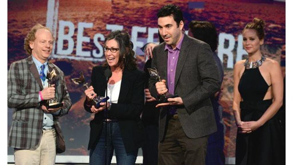 Producers (from left) Bruce Cohen, Donna Gigliotti and Jonathan Gordon and actress Jennifer Lawrence accept the Best Feature award for Silver Linings Playbook onstage during the 2013 Film Independent Spirit Awards at Santa Monica Beach last night.