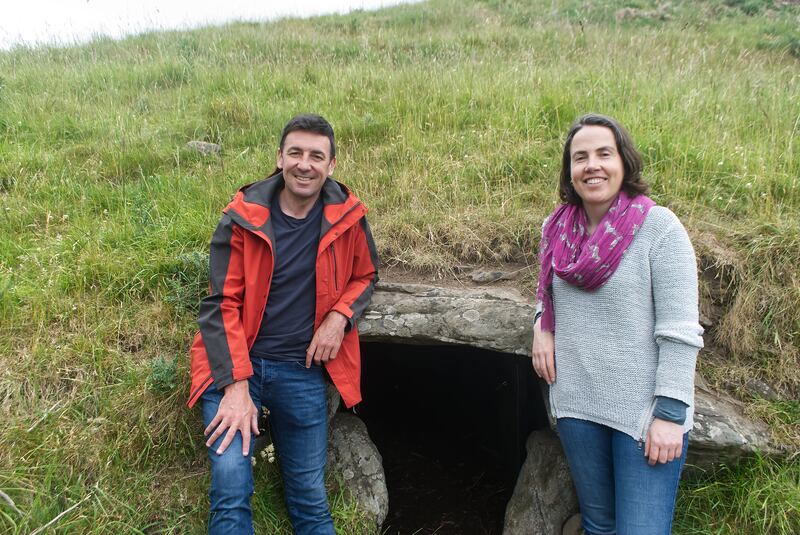 Rún an Bóinne: presenter Seán Mac an tSíthigh and archaeologist Clíodhna Ní Lionáin at Dowth passage tomb