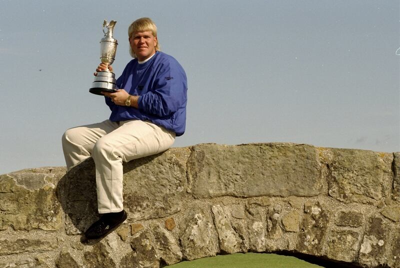 John Daly holds the Claret Jug at St Andrews following his victory in the 1995 British Open. Photograph: Jon Cuban/Allsport
