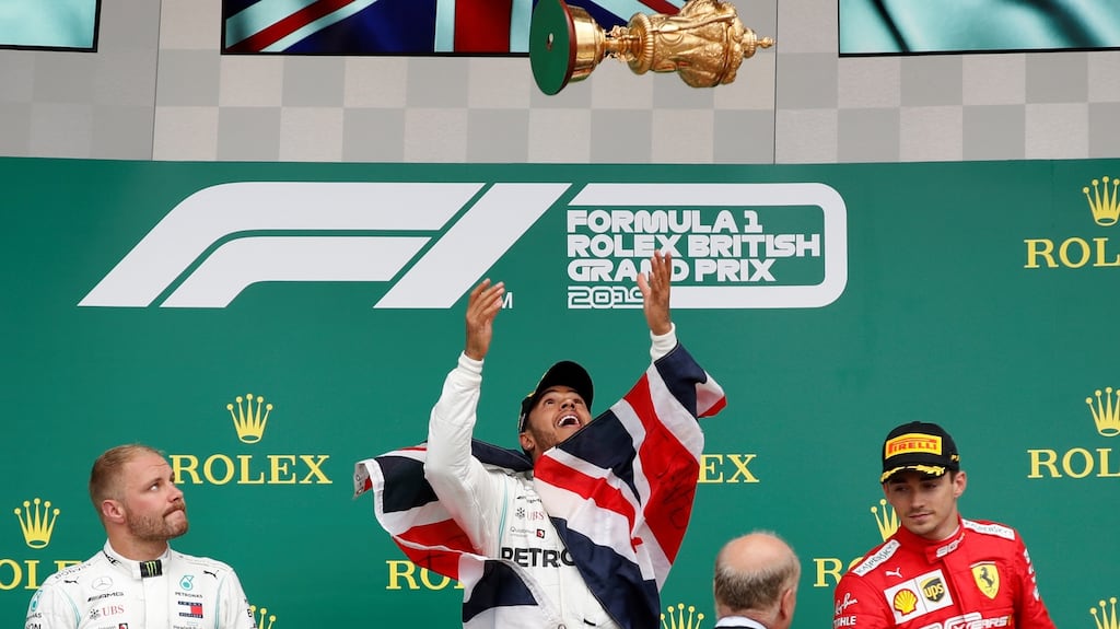 Lewis Hamilton celebrates his British Grand Prix win at Silverstone. Photograph: Matthew Childs/Reuters