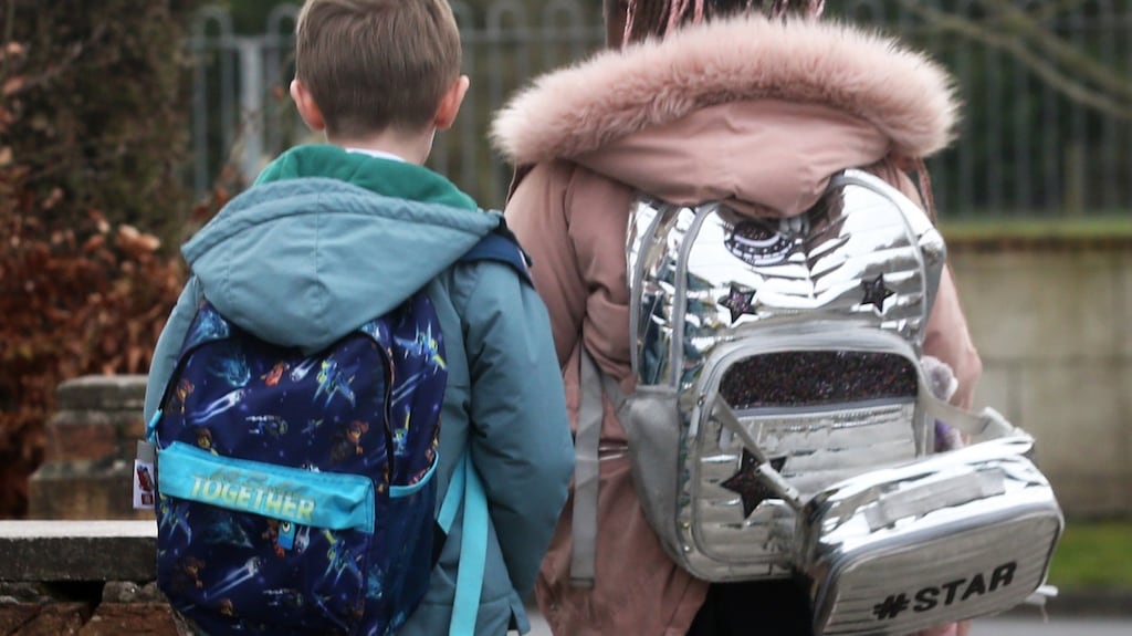 18/03/2021. STOCKTwo primary school children carry schoolbags on their way home from school.Photograph :  Laura Hutton / The Irish Times