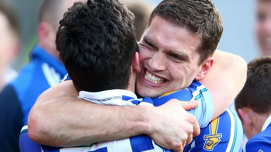 Conal Keaney celebrates with Ballyboden team-mate Colm Basquel after winning the All-Ireland football club final at Croke Park last March. Photograph: Cathal Noonan/Inpho