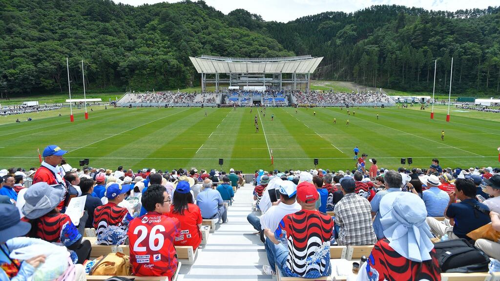 Rugby fans attend the inaugural game at the Kamaishi Restoration Stadium in Kamaishi, Iwate, Japan. The stadium will host two games during the Rugby World Cup next year. Photograph: Koki Nagahama/Getty Images