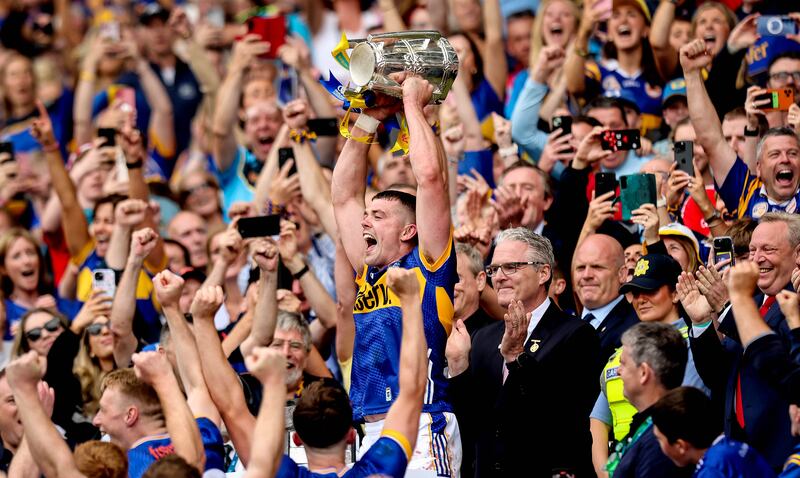 Tipperary’s Ronan Maher lifts the Liam MacCarthy Cup. Photograph: Ryan Byrne/Inpho
