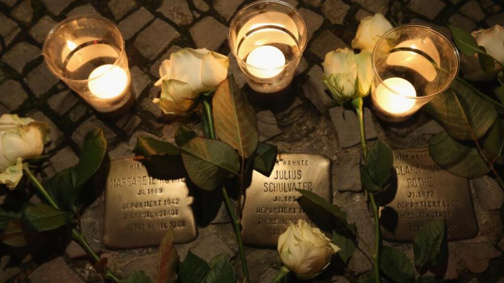 Candles placed at Stolpersteine on November 9th as locals honour the 75th anniversary of Kristallnacht pogroms. Photograph: Sean Gallup/Getty Images