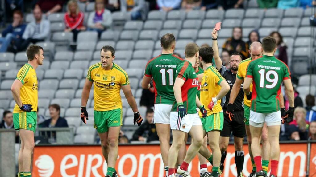 Mayo’s Kevin Keane is red-carded by referee David Gough for striking Donegal’s Michael Murphy. The Central Hearings Committee has lifted the Mayo man’s subsequent suspension. Photograph: James Crombie/Inpho
