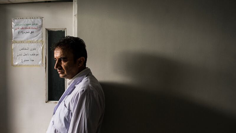 Dr Khalil Ahmad Pashtoonyar, deputy director of the Afghan government’s forensic medicine directorate, where female virginity tests are carried out. Photograph: Andrew Quilty/New York Times