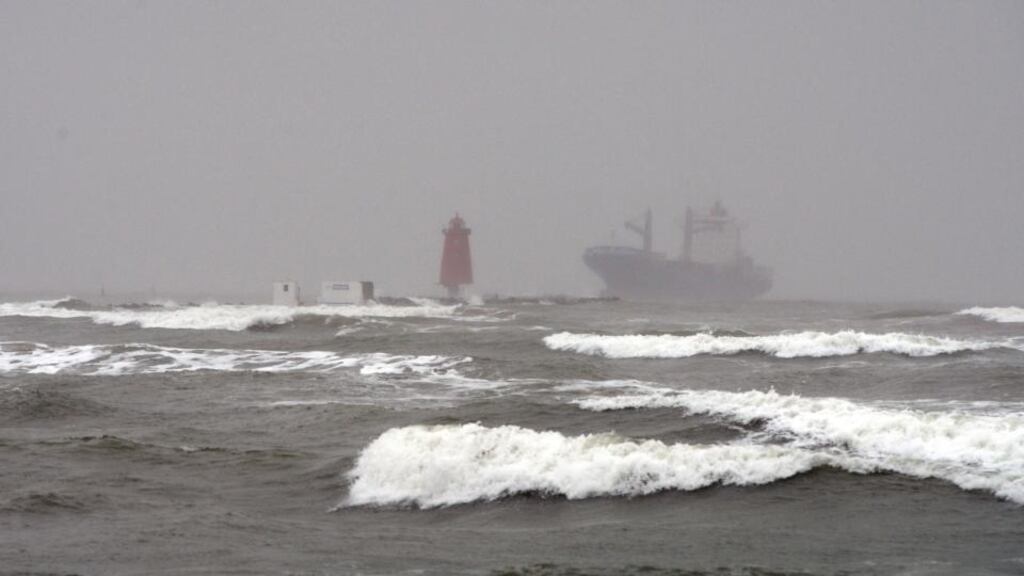 A container ship arrives in Dublin Port. Photograph: Alan Betson