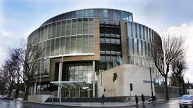 Garda had man at gunpoint in attic, trial told