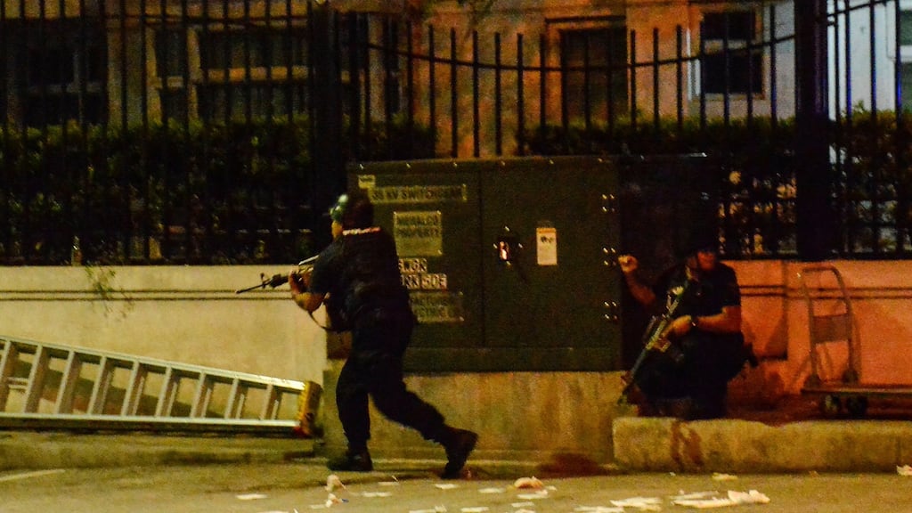 Filipino elite Police Special Weapons and Tactical personnel outside the Resort World Manila. Photograph: EPA