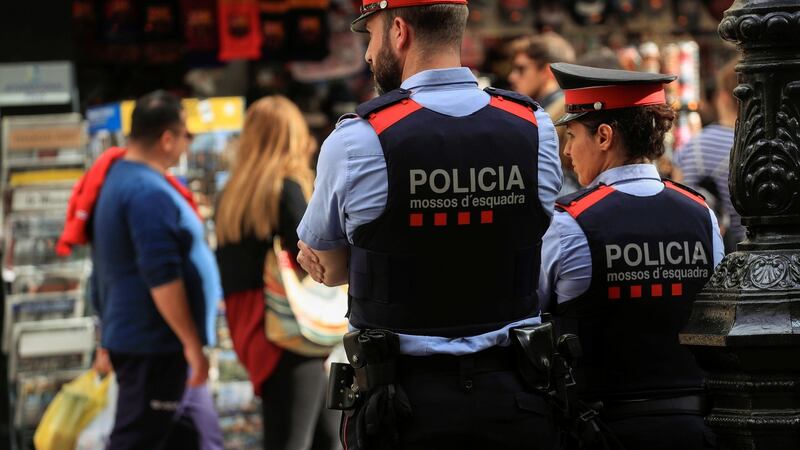 Mossos d’Esquadra, Catalan regional police officers, patrol along La Rambla street the day after the Catalan regional parliament declared independence from Spain in Barcelona. Photograph: Juan Medina/Reuters