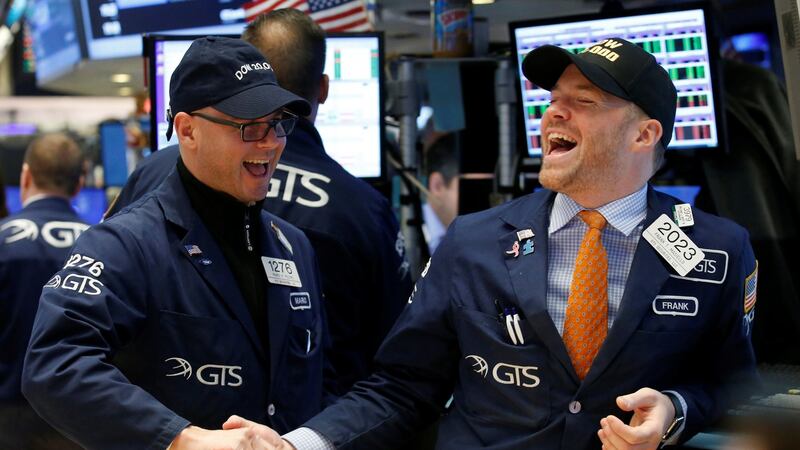 Traders celebrate on the main trading floor of the New York Stock Exchange (NYSE) as the Dow Jones Industrial Average passes the 20,000 mark shortly after the opening of the trading session in New York, U.S., January 25, 2017. REUTERS/Brendan McDermid TPX IMAGES OF THE DAY Traders celebrate on the main trading floor of the New York Stock Exchange (NYSE) as the Dow Jones Industrial Average passes the 20,000 mark shortly after the opening of the trading session in New York, U.S., January 25, 2017. REUTERS/Brendan McDermid TPX IMAGES OF THE DAY