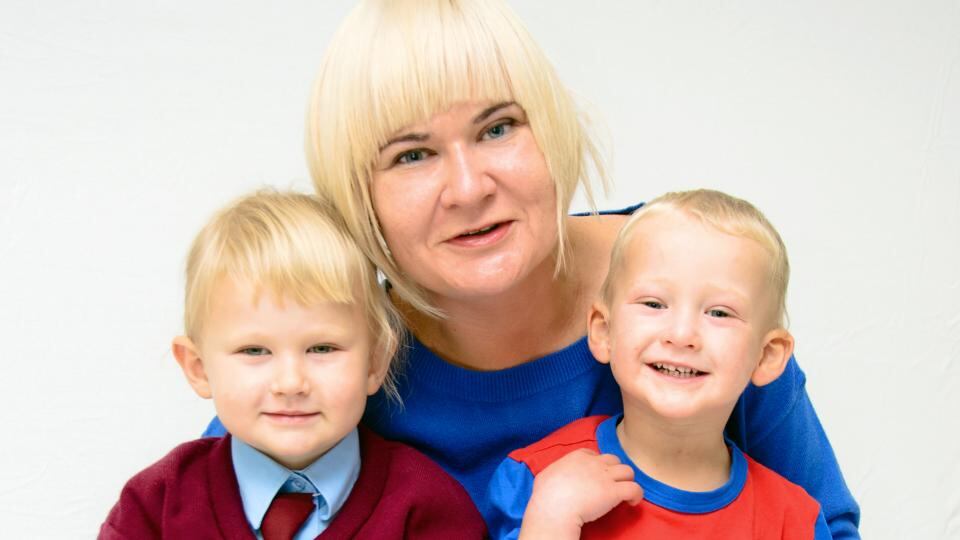 Aneta Kubas, and her two sons, Kalina who is six and four-year-old Lubomir. Photograph: SilverMerick Studio