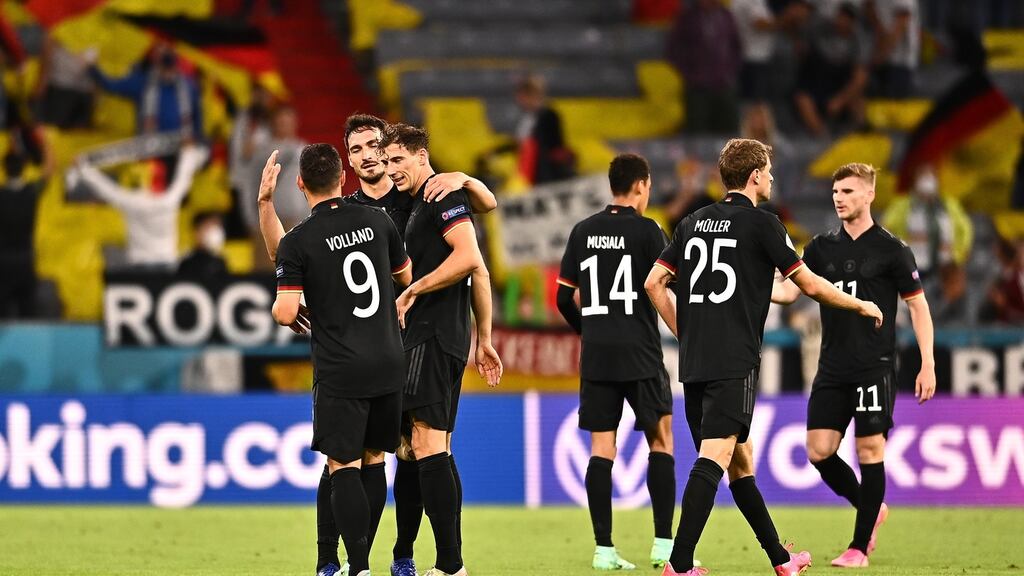 German players celebrate after they drew 2-2 with Hungary in Munich. Photo: Lukas Barth-Tuttas/EPA