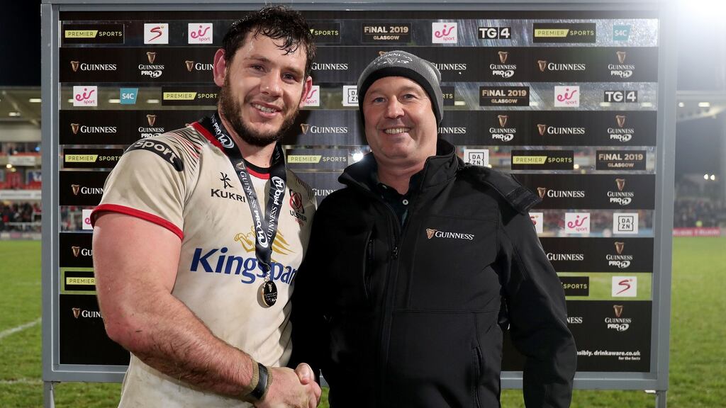 Ulster’s Marcell Coetzee is presented with the man of the match award by Barney McCann after the Pro14 win over Munster. Photograph: Dan Sheridan/Inpho