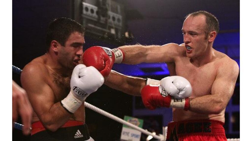 Brian Magee in action against Roman Aramian during their European Super Middleweight title fight at the National Stadium (Photograph: Cathal Noonan/Inpho)
