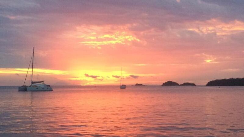 Sunset in Antigua from the boat. Photograph: The Adventures of Rogue Trader/Facebook