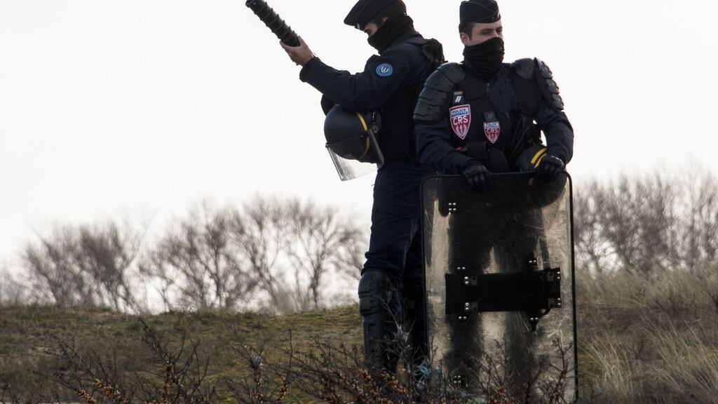File photograph of French officers. French anti-terrorism police have arrested a small group with Islamist militant ties File photograph: Denis Charlet/AFP/Getty Images