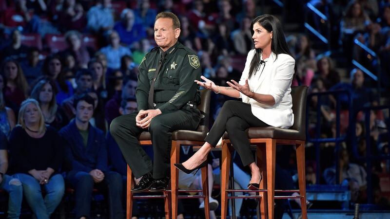 National Rifle Association spokeswoman Dana Loesch answers a question next to Broward sheriff Scott Israel during a CNN town hall meeting about gun control in Sunrise, Florida on Wednesday. Photograph: Michael Laughlin/South Florida Sun-Sentinel via AP
