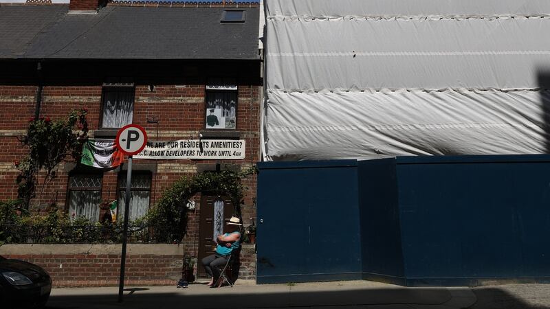 73-year-old
Tommy Byrne, a retired Fás employee, lives with his wife at one end of this row. He has a big off-white sign that reads: “Where are our residents’ amenities?” Photograph: Nick Bradshaw