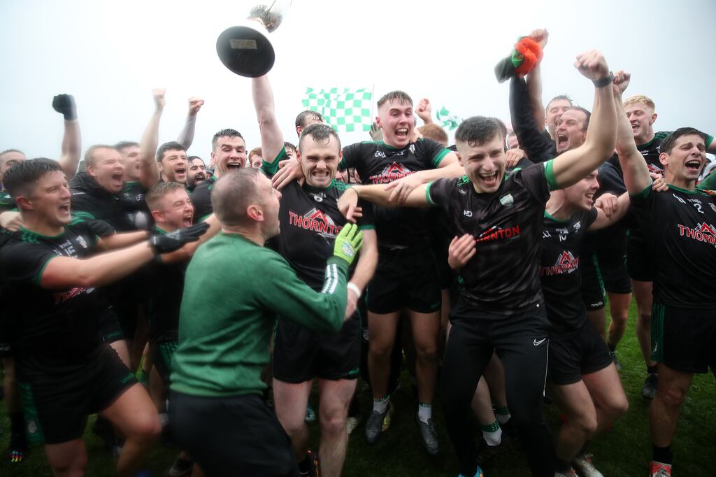 Cargin’s captain James Laverty and the team celebrate their win in the Antrim SFC Final over St Mary’s, Aghagallon at Corrigan Park in Belfast. Photograph: Declan Roughan/Inpho