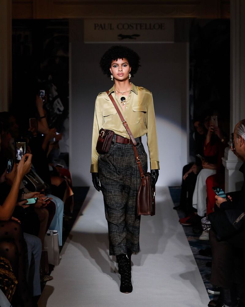 A model presents one of Paul Costelloe’s designs at his London Fashion Week Women’s A/W19 show on Monday