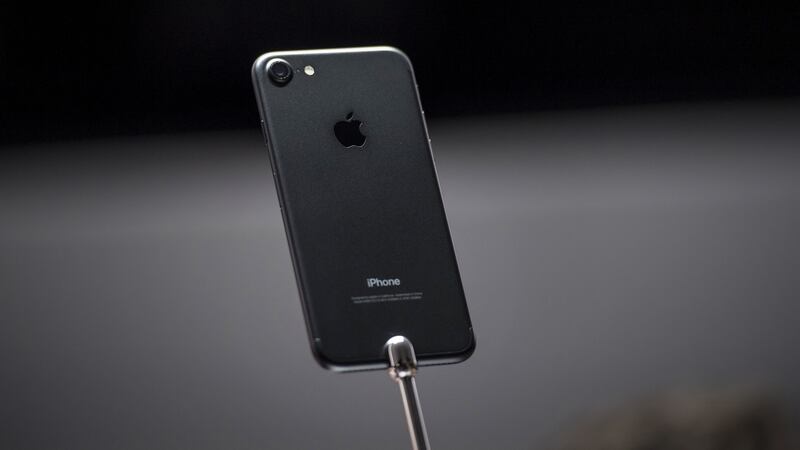 The iPhone 7 is displayed during an event in San Francisco, California. Apple unveiled new iPhone models featuring a water-resistant design, upgraded camera system and faster processor. Photograph: David Paul Morris/Bloomberg