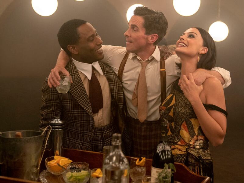 John David Washington, Christian Bale and Margot Robbie in Amsterdam. Photograph: Merie Weismiller/20th Century Studios