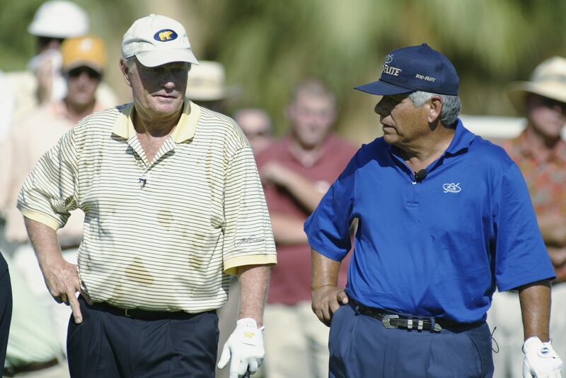 Jack Nicklaus and Lee Trevino wait on a tee box in Palm Desert, California, in 2002, possibly stilling thinking about the hole-in-one that Trevino sank 15 years previously. Photograph: Scott Halleran/Getty Images