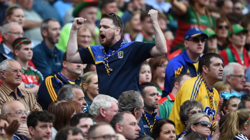 Roscommon fans cheer on their team during their All-Ireland SFC semi-final draw with Mayo. Photo: Inpho