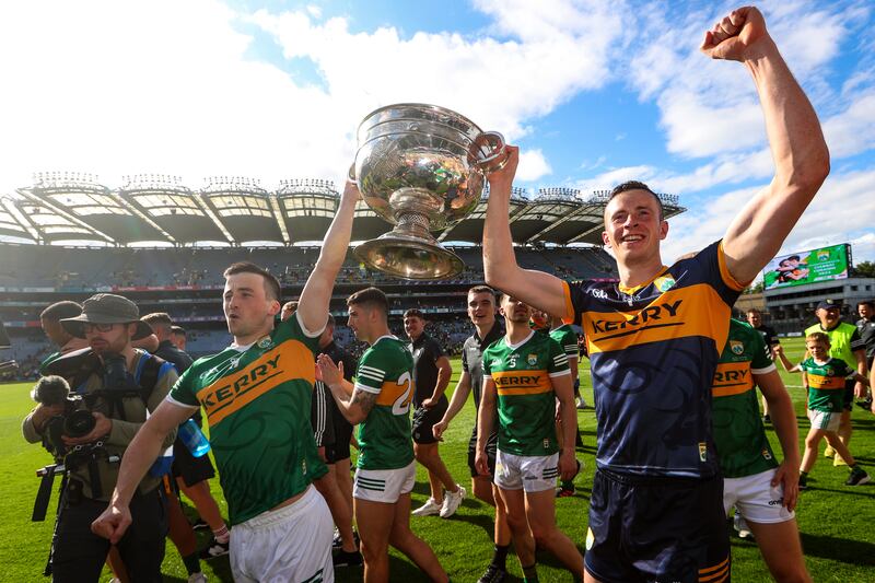 Kerry's Paul Murphy and goalkeeper Shane Ryan celebrate with the Sam Maguire Cup after victory over Galway in the All-Ireland final at Croke Park. Photograph; Ryan Byrne/Inpho