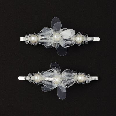 Simone Rocha x H&M: the faux-pearl hair grips I bought. They cost €22.99