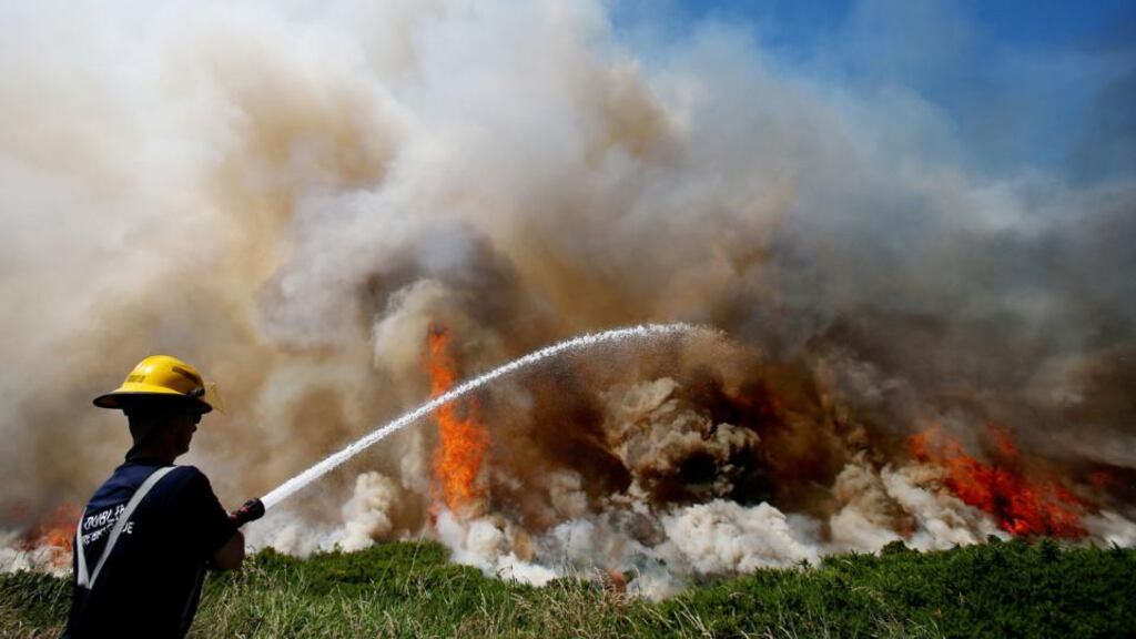 A Dublin Fire Brigade spokeswoman said firefighters were working “flat out” to contain the blaze and did not expect to be finished “any time soon”. Photograph: Julien Behall/PA Wire