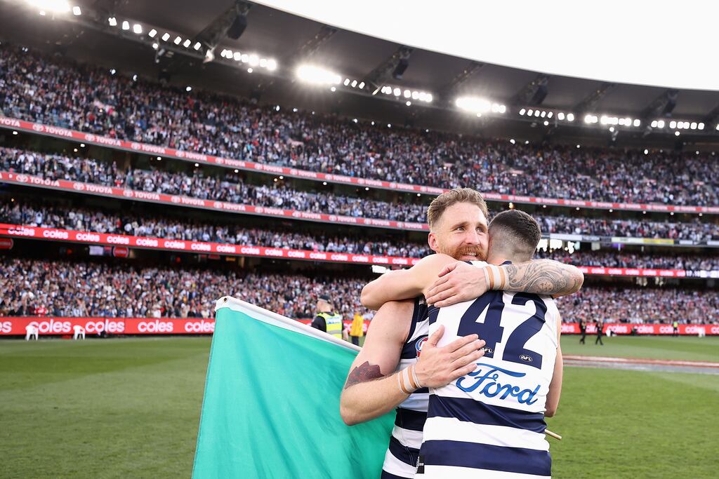 Zach Tuohy hugs Geelong Cats team-mate Mark O'Connor after the AFL Grand Final win over Sydney Swans at the Melbourne Cricket Ground. Photograph: Cameron Spencer/AFL Photos/via Getty Images