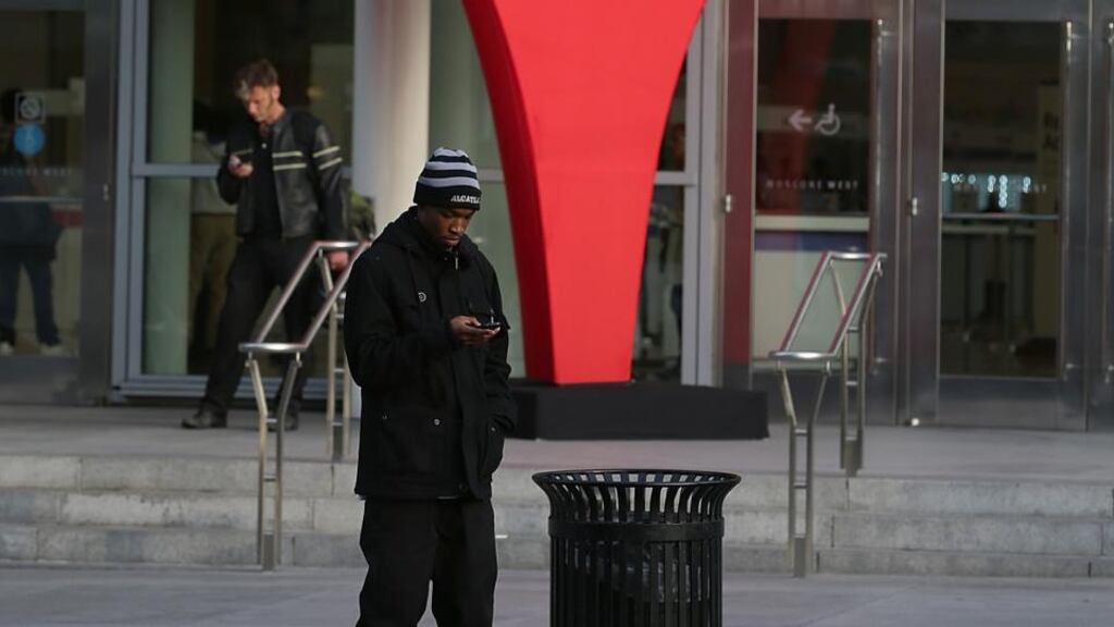 A man stands next to an oversized Google map marker pin as attendees wait to enter the Google I/O developers conference at the Moscone Center on May 15, 2013 in San Francisco, California. Photograph: Justin Sullivan/Getty Images